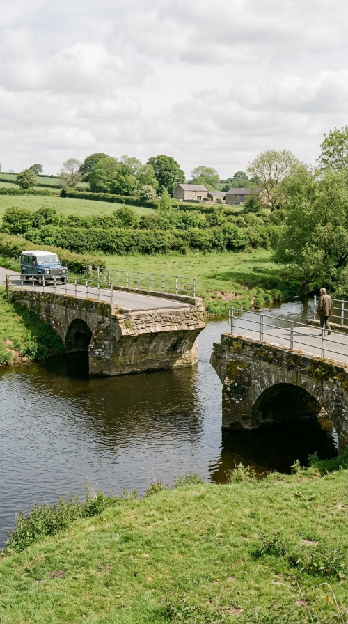 The missing bit bridge. A beautiful rural scene. A bridge over a river, but unfortunately the middle part of the bridge is absent.